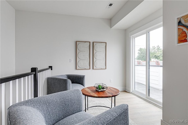 1823 W Cary St Unit A, Richmond, VA 23220 - living area with light wood-style flooring and baseboards