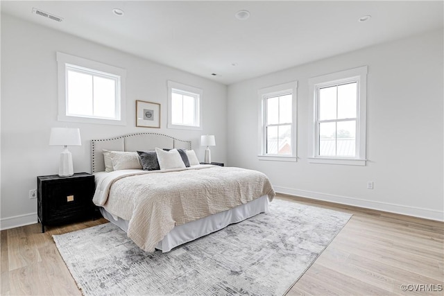 1823 W Cary St Unit A, Richmond, VA 23220 - bedroom featuring baseboards and light wood finished floors