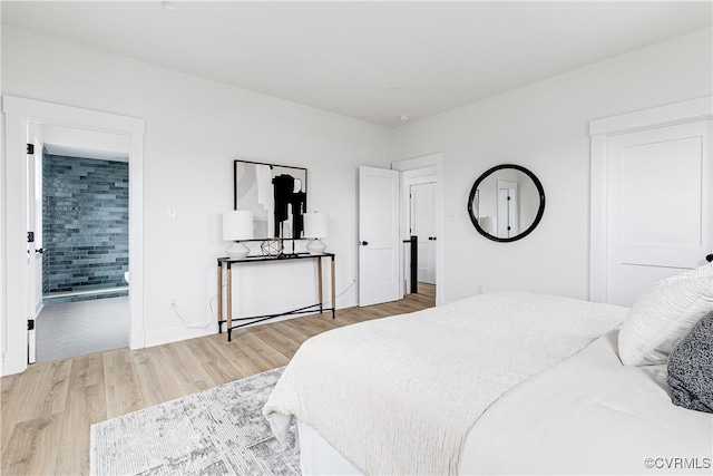 1823 W Cary St Unit A, Richmond, VA 23220 - bedroom featuring wood finished floors and baseboards