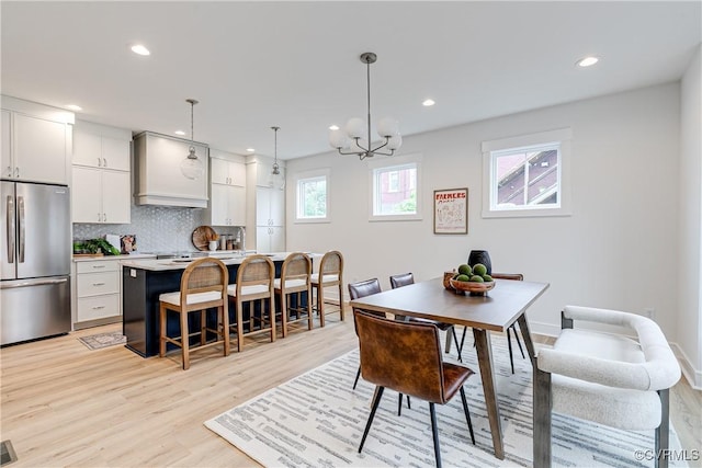 1823 W Cary St Unit A, Richmond, VA 23220 - dining area with light wood finished floors, a chandelier, and recessed lighting