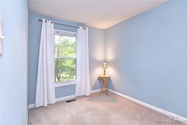 404 Arabian Cir, Yorktown, VA 23693 - carpeted empty room with baseboards and a textured ceiling