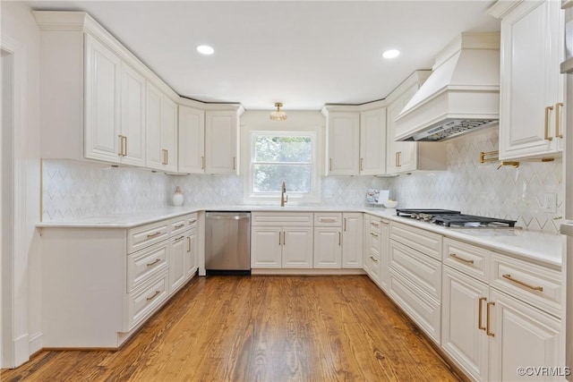 13511 W Salisbury Rd, Chesterfield, VA 23113 - kitchen featuring appliances with stainless steel finishes, custom range hood, light countertops, white cabinets, and recessed lighting