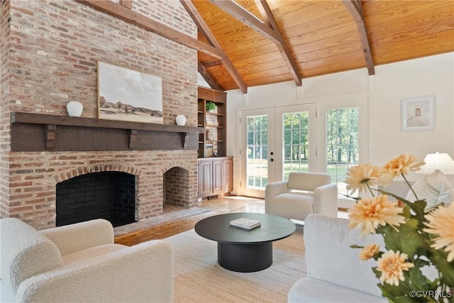 13511 W Salisbury Rd, Chesterfield, VA 23113 - living room with a wood ceiling with exposed beams, built in features, wood finished floors, a brick fireplace, and french doors