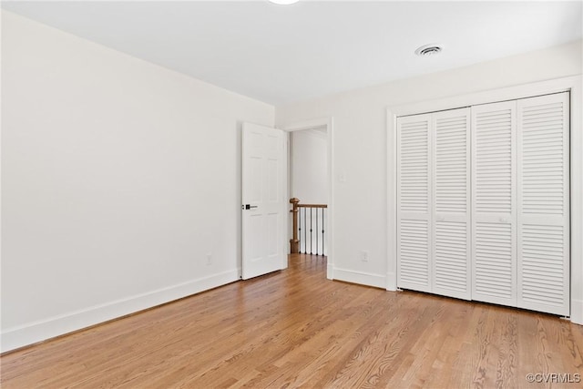 13511 W Salisbury Rd, Chesterfield, VA 23113 - unfurnished bedroom with light wood-type flooring and a closet