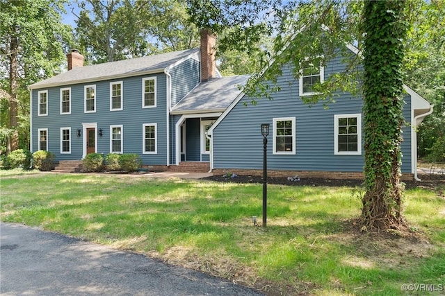 13511 W Salisbury Rd, Chesterfield, VA 23113 - colonial inspired home featuring a chimney and a front lawn