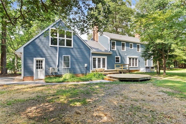 13511 W Salisbury Rd, Chesterfield, VA 23113 - back of house with french doors, a chimney, and a wooden deck