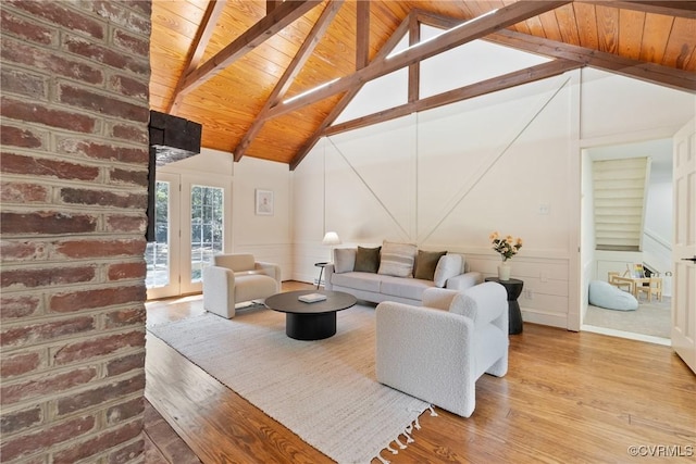 13511 W Salisbury Rd, Chesterfield, VA 23113 - living room with a wooden ceiling with exposed beams, wood finished floors, a decorative wall, french doors, and wainscoting