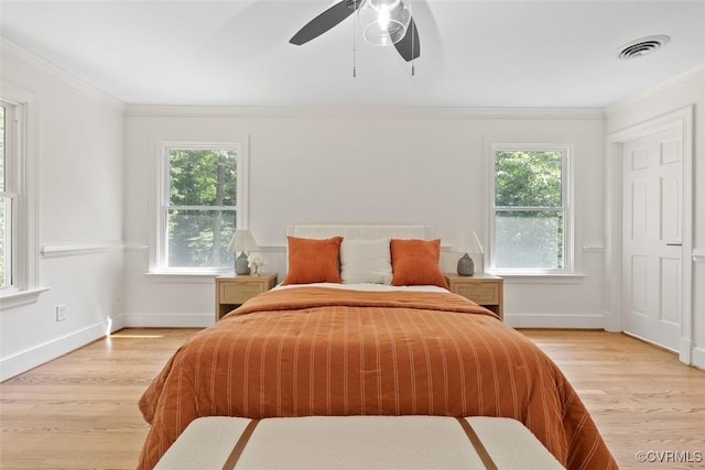 13511 W Salisbury Rd, Chesterfield, VA 23113 - bedroom with multiple windows, light wood finished floors, crown molding, and a ceiling fan