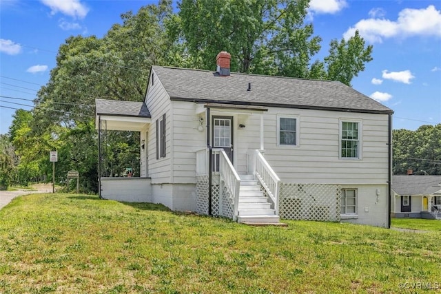 1505 Floyd St, Petersburg, VA 23803 - bungalow with a front lawn, a chimney, and a shingled roof