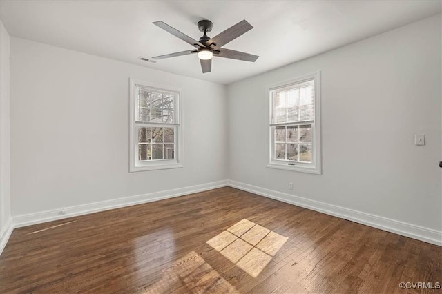 1505 Floyd St, Petersburg, VA 23803 - empty room featuring healthy amount of natural light, wood finished floors, and ceiling fan