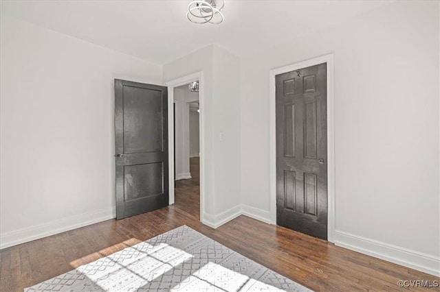 1505 Floyd St, Petersburg, VA 23803 - unfurnished bedroom featuring wood finished floors and baseboards