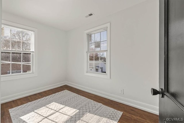1505 Floyd St, Petersburg, VA 23803 - spare room with dark wood finished floors