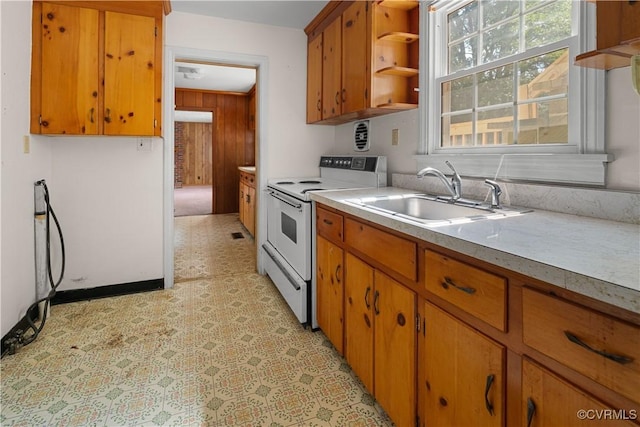 414 John St, Ashland, VA 23005 - kitchen with white range with electric stovetop, open shelves, light floors, and healthy amount of natural light