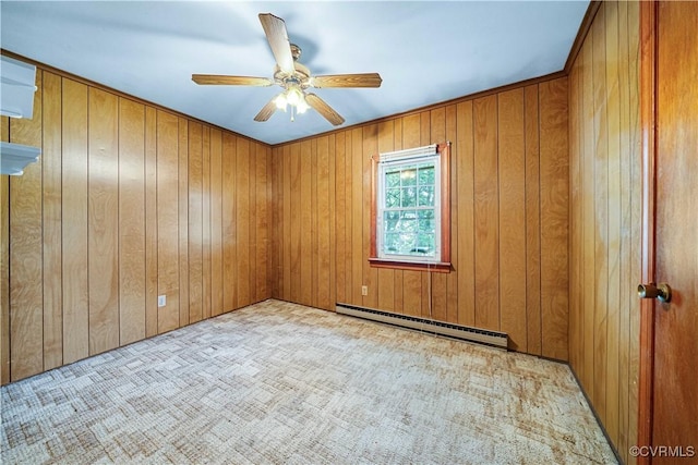 414 John St, Ashland, VA 23005 - carpeted spare room featuring a baseboard heating unit, a ceiling fan, and wooden walls
