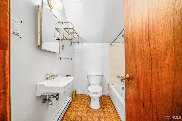 414 John St, Ashland, VA 23005 - bathroom with baseboard heating and bathing tub / shower combination