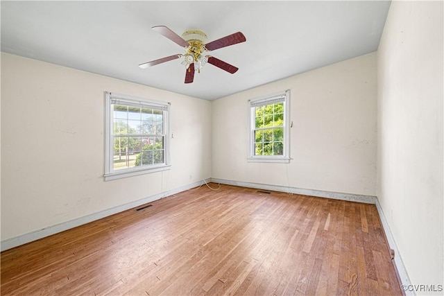 414 John St, Ashland, VA 23005 - empty room with wood-type flooring and a ceiling fan