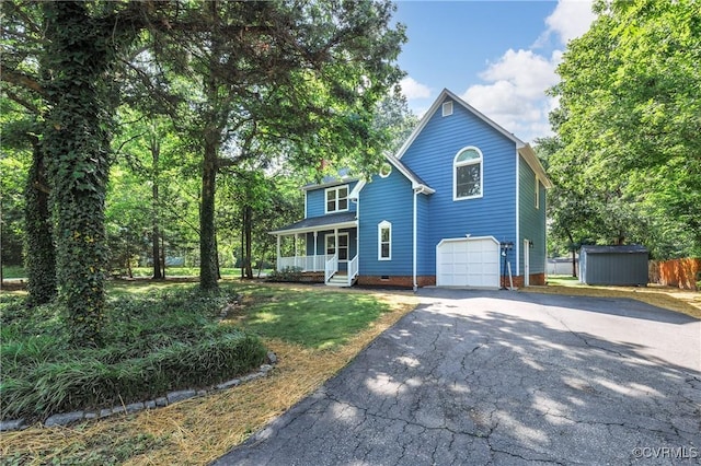 14106 Pensive Pl, Midlothian, VA 23112 - view of front of home with a porch, asphalt driveway, a storage unit, an attached garage, and crawl space