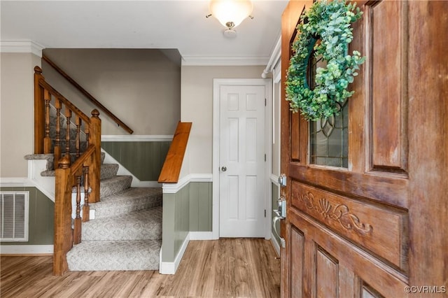 14106 Pensive Pl, Midlothian, VA 23112 - foyer entrance with light wood-style floors, stairway, and ornamental molding