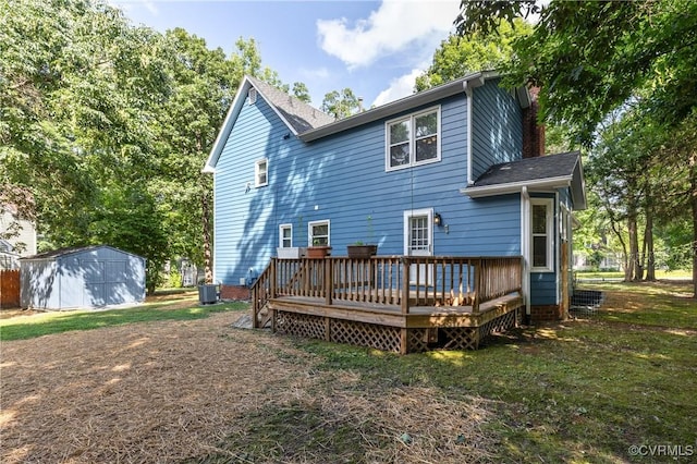 14106 Pensive Pl, Midlothian, VA 23112 - back of house featuring a deck, a storage unit, a chimney, and a shingled roof