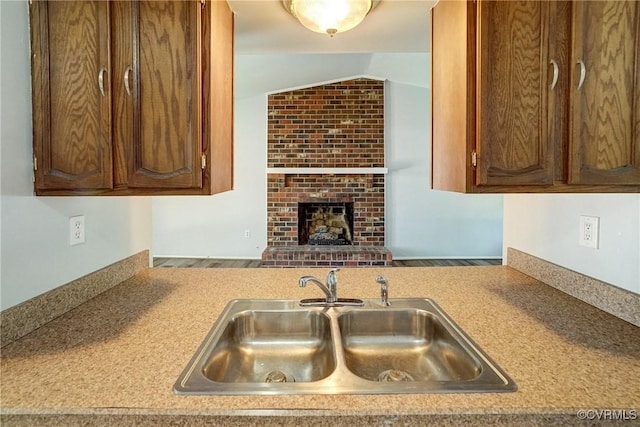 7131 Brook Way, Mechanicsville, VA 23111 - kitchen featuring light countertops and a fireplace