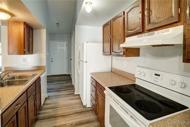 7131 Brook Way, Mechanicsville, VA 23111 - kitchen with white appliances, under cabinet range hood, light wood-type flooring, light countertops, and brown cabinets
