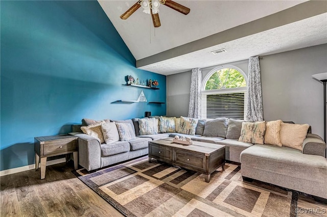 7100 Deer Thicket Dr, Midlothian, VA 23112 - living area featuring vaulted ceiling, ceiling fan, and wood finished floors