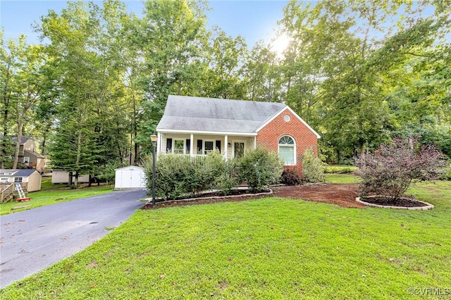 7100 Deer Thicket Dr, Midlothian, VA 23112 - view of front of home with a front yard, brick siding, and a shed
