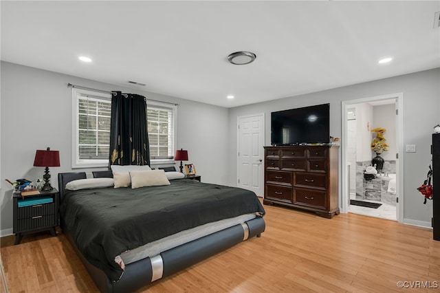 12900 Spring Run Rd, Midlothian, VA 23112 - bedroom with light wood-style flooring, recessed lighting, and connected bathroom