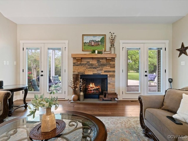 1130 Sparrows Ln, Powhatan, VA 23139 - living area with french doors, wood-type flooring, and a fireplace