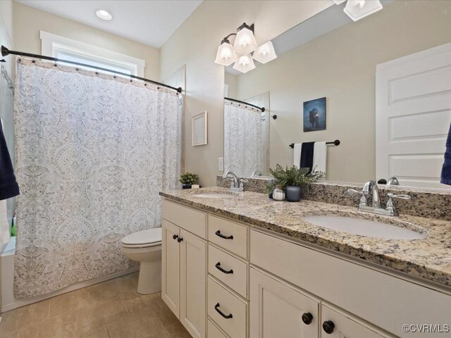 1130 Sparrows Ln, Powhatan, VA 23139 - bathroom with double vanity, tile patterned flooring, and shower / tub combo with curtain