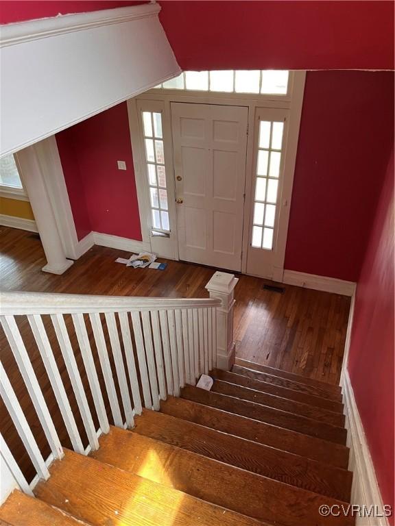 2214 2nd Ave, Richmond, VA 23222 - stairway with wood-type flooring, vaulted ceiling, and healthy amount of natural light