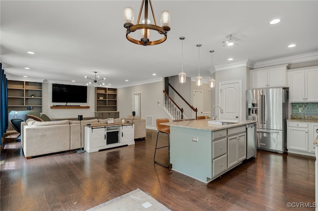 8307 Blackrail Pl, Chesterfield, VA 23832 - kitchen with a chandelier, stainless steel appliances, ornamental molding, open floor plan, and recessed lighting