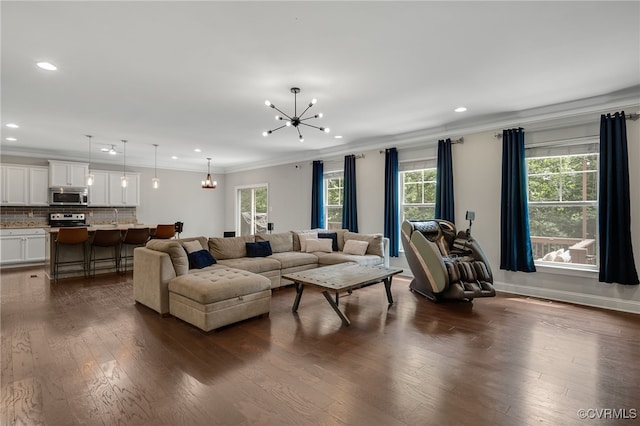 8307 Blackrail Pl, Chesterfield, VA 23832 - living area featuring a chandelier, ornamental molding, dark wood finished floors, and recessed lighting
