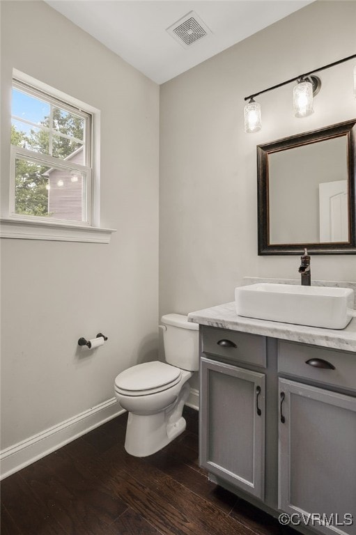 8307 Blackrail Pl, Chesterfield, VA 23832 - half bathroom with wood finished floors and vanity