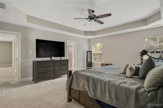 8307 Blackrail Pl, Chesterfield, VA 23832 - bedroom with a tray ceiling, light carpet, multiple windows, and a ceiling fan