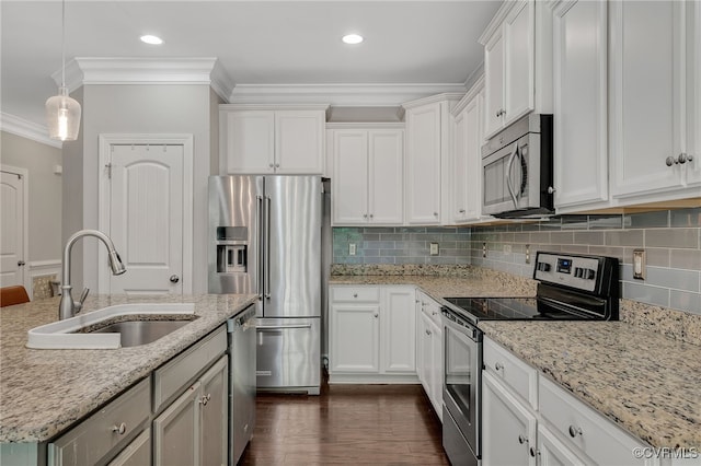 8307 Blackrail Pl, Chesterfield, VA 23832 - kitchen featuring stainless steel appliances, crown molding, white cabinets, tasteful backsplash, and pendant lighting