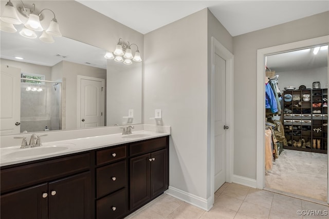 8307 Blackrail Pl, Chesterfield, VA 23832 - bathroom with tile patterned flooring, double vanity, a stall shower, and a walk in closet