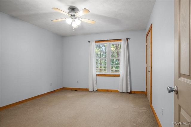 14560 Meade Rd, Amelia, VA 23002 - empty room with light carpet and a ceiling fan
