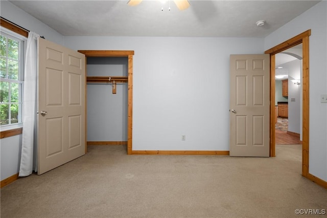 14560 Meade Rd, Amelia, VA 23002 - unfurnished bedroom with carpet flooring, ceiling fan, and a closet