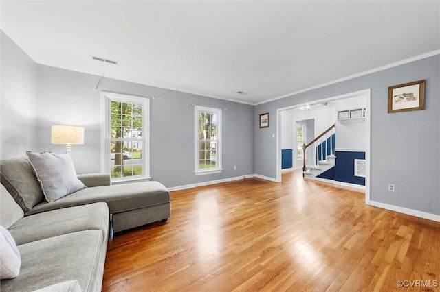 4709 Tameo Ct, Glen Allen, VA 23060 - living room with stairs, crown molding, and light wood-style floors