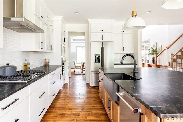 11075 Ellis Meadows Ln, Glen Allen, VA 23059 - kitchen featuring wall chimney exhaust hood, stainless steel appliances, wood finished floors, recessed lighting, and decorative backsplash