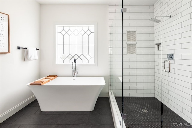 11075 Ellis Meadows Ln, Glen Allen, VA 23059 - bathroom with tile patterned flooring, a stall shower, and a freestanding bath
