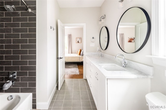 11075 Ellis Meadows Ln, Glen Allen, VA 23059 - ensuite bathroom featuring double vanity, bathtub / shower combination, and tile patterned floors