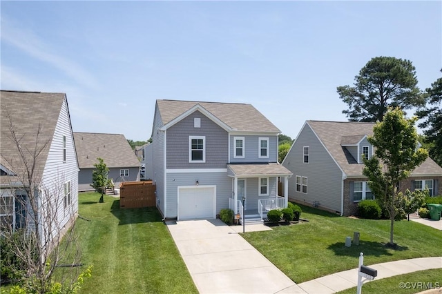 1712 Binford Ct, Cobbs Creek, VA 23223 - view of front of property with a garage, concrete driveway, a front yard, and covered porch