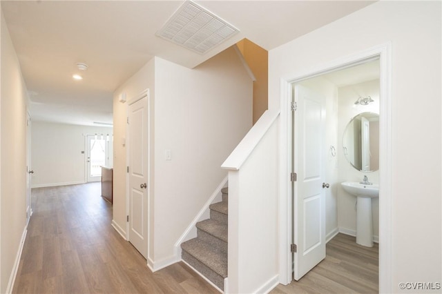 1712 Binford Ct, Cobbs Creek, VA 23223 - staircase with wood finished floors and recessed lighting