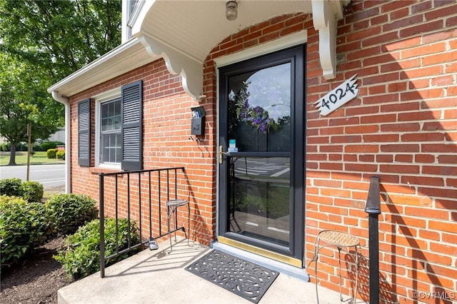 4024 W Grace St, Richmond, VA 23230 - doorway to property featuring brick siding