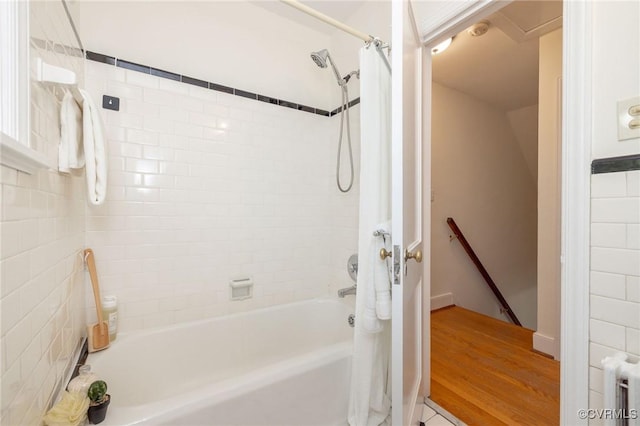 4024 W Grace St, Richmond, VA 23230 - bathroom with radiator and shower / bathtub combination with curtain