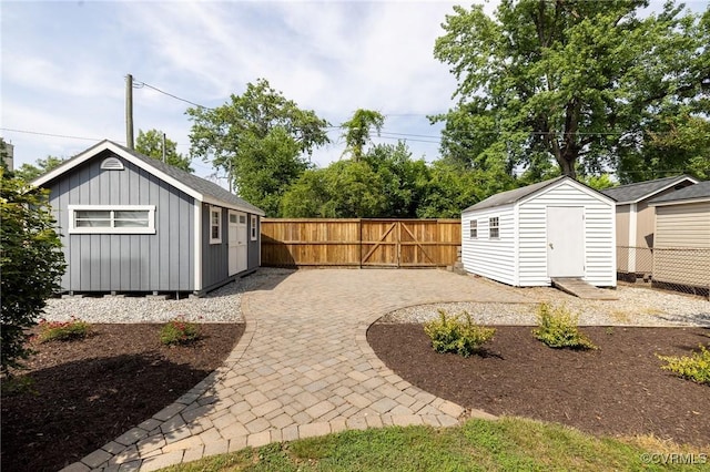4024 W Grace St, Richmond, VA 23230 - fenced backyard featuring a patio and a shed