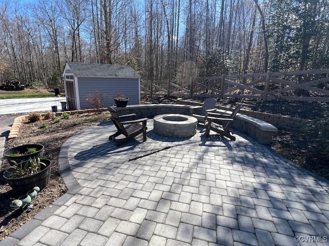 9377 Magnolia Blossom Rd, Ashland, VA 23005 - view of patio featuring a fire pit and a storage shed
