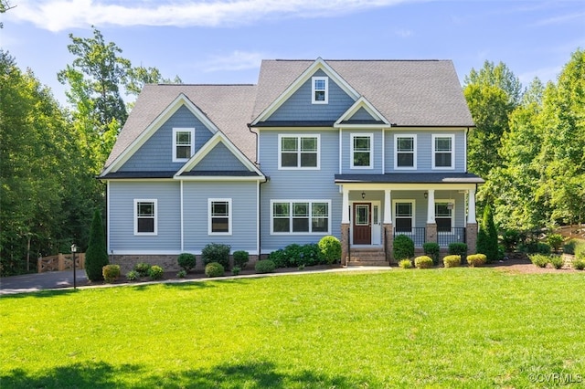 9377 Magnolia Blossom Rd, Ashland, VA 23005 - craftsman-style house featuring covered porch and a front yard